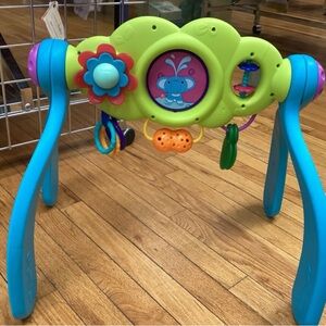 Bumbo Stages Safari Activity Gym. 2 sides of adjustable play with 9 sensory toys